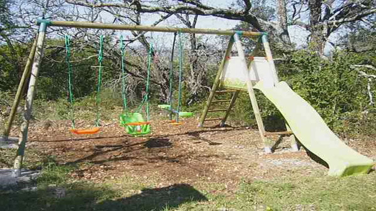Installer balancoire jardin
