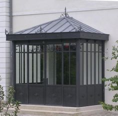 veranda acier bordeaux