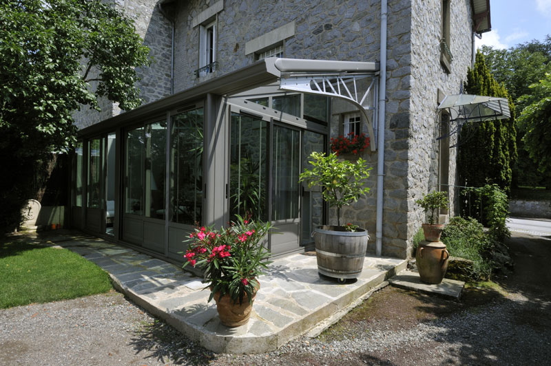 veranda maison pierre extÃ©rieur