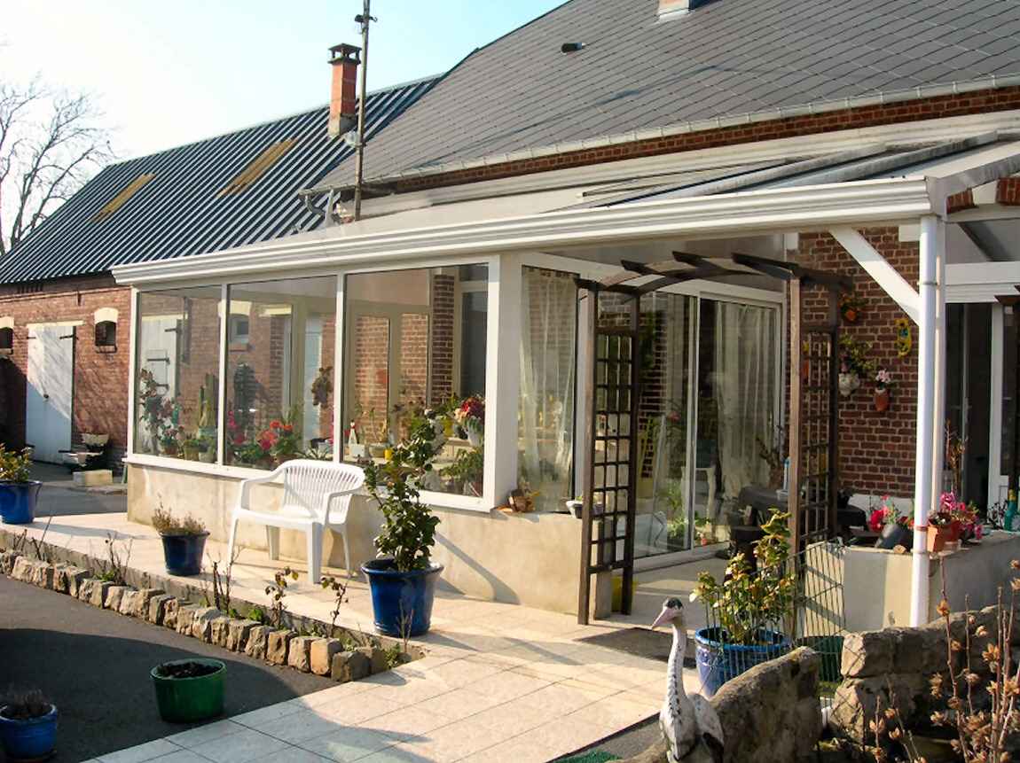 veranda fermee loi carrez