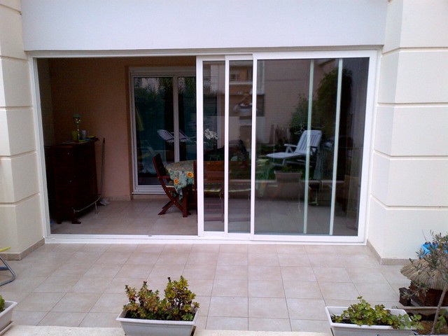 porte coulissante en verre pour veranda