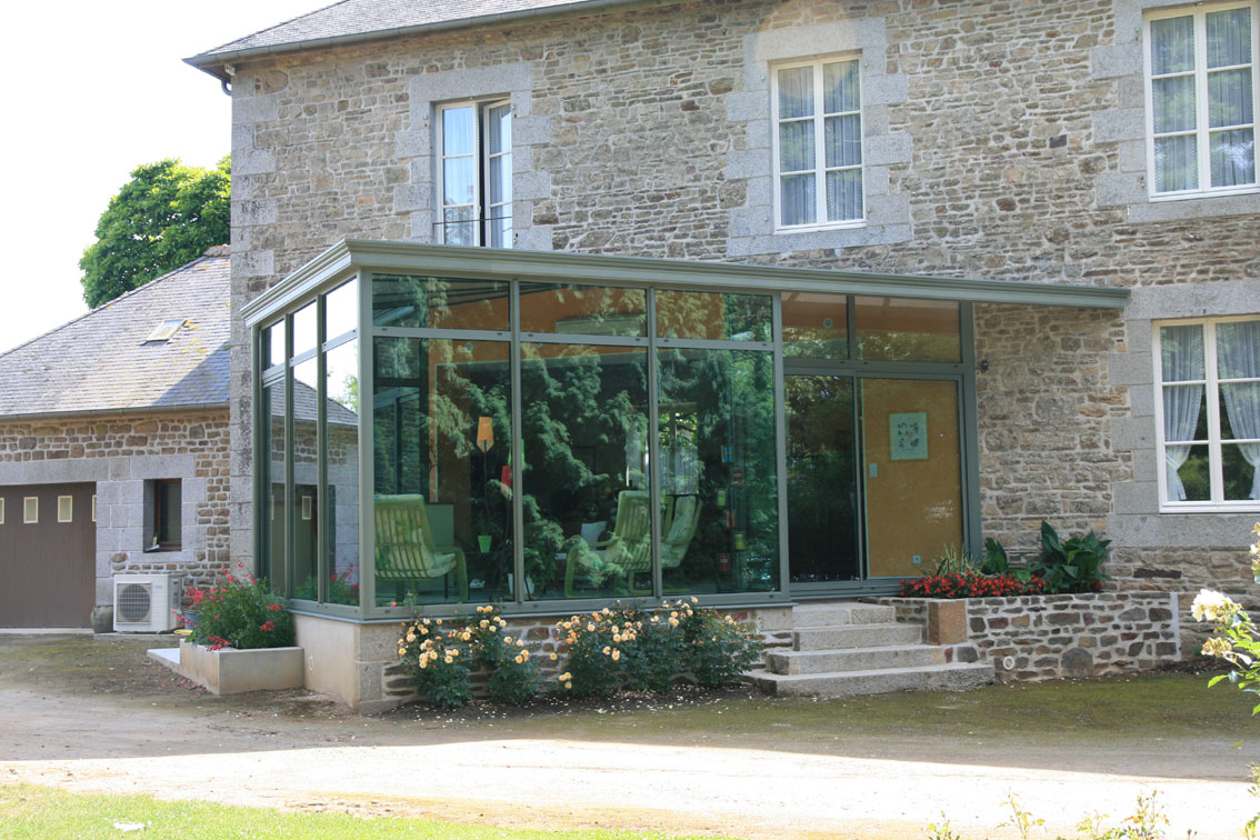 veranda maison pierre extÃ©rieur