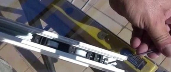 roulette porte coulissante veranda