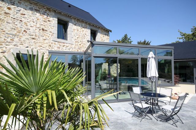 veranda maison pierre extÃ©rieur