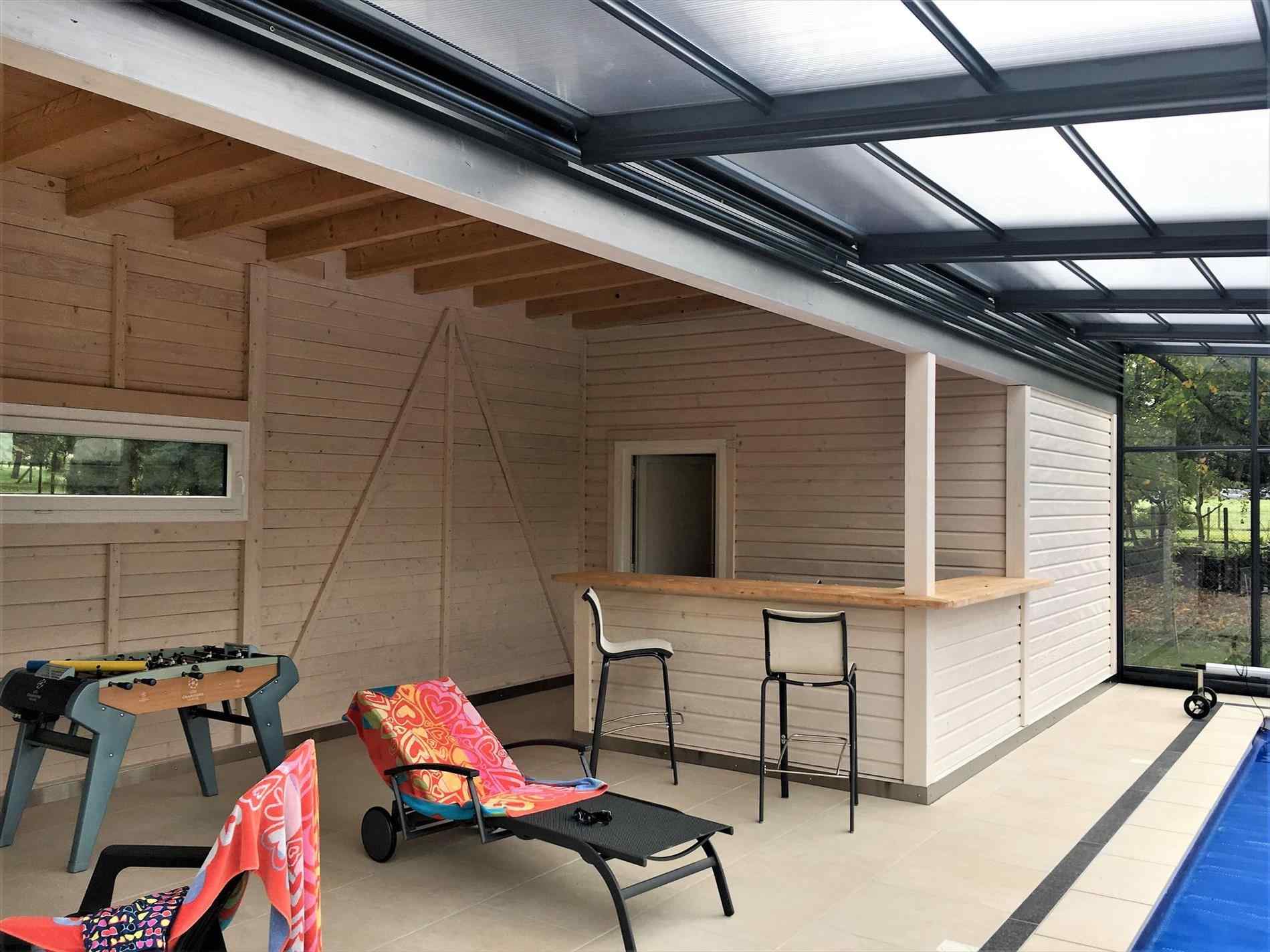 veranda sur maison en v